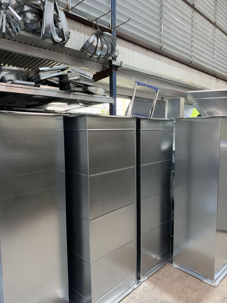 Lengths of rectangular duct standing upright