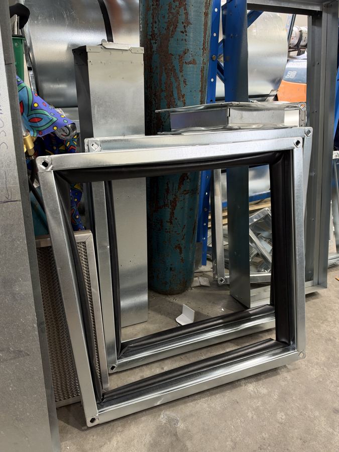 Duct frame with flexible connection