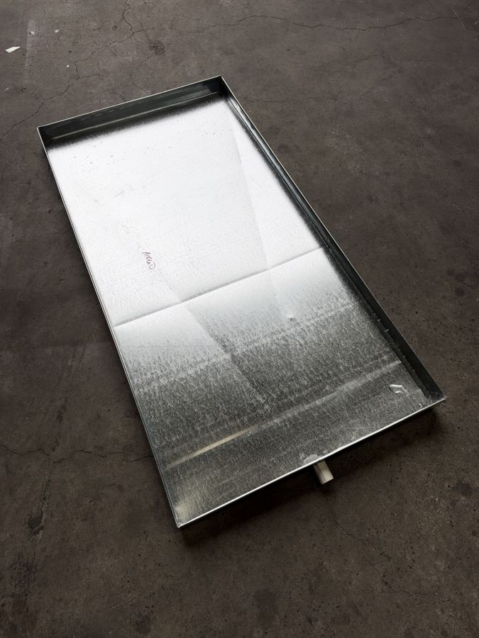 Galvanised drip tray with drain outlet